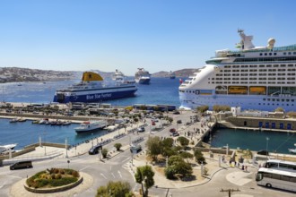 Mykonos, Cyclades, Greece - Mykonos New Port, a Blue Star Ferries ferry and a cruise ship are