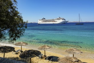 Mykonos, Cyclades, Greece - Cruise ship MSC Lirica is located in Mykonos Harbour Bay. Cruise ships