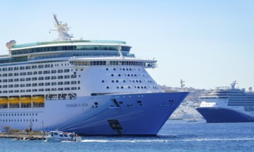 Mykonos, Cyclades, Greece - Voyager of the Seas cruise ship is located in Mykonos New Port. In the