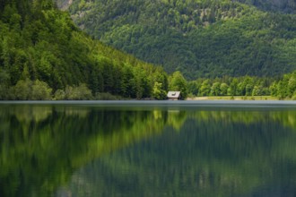 Landscape of Lake Offensee after rain when the sun comes through the clouds in spring,