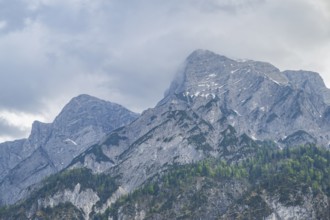 View into the mountains next to Lake Traunsee on a rainy day in spring, Traunstein summit,