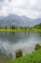 Landscape of Lake Almsee on a rainy day in spring, Salzkammergut, Austria