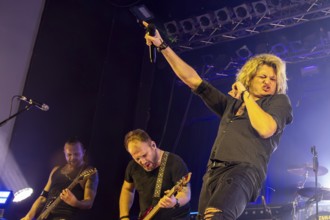 Ande Braun (guitarist), Steffen Haile (bassist) and Hannes Braun (singer) of the band Kissin'