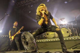 Steffen Haile (bass player) and Hannes Braun (singer) of the band Kissin' Dynamite live on Back