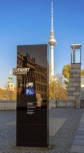 Black information columns with signs and signs on the forecourt of the Humboldt Forum Berlin,