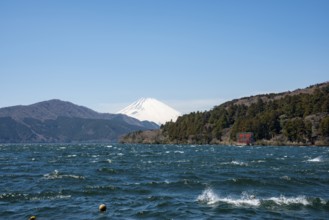 View of Lake Ashi with Mount Fuji volcano and peace torii from Hakone Shrine, Hakone, Japan