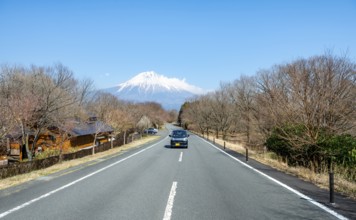Car on road, road leads to Mount Fuji volcano, wanderlust, Yamanashi Prefecture, Japan
