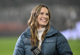DAZN presenter reporter Christina Rann smiles microphone Mikro MHPArena, MHP Arena Stuttgart,