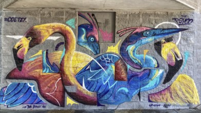 Street art mural in Buenos Aires with colorful flamingos and herons, Buenos Aires, Argentina