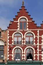 Old brick house painted in red and white, market square, Bruges, UNESCO World Heritage Site, West