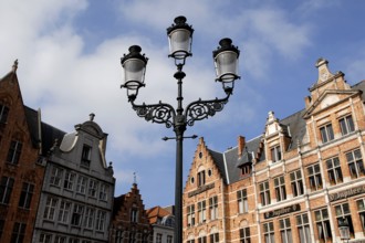 Street lamp in front of historic building view, Market Square, Bruges, UNESCO World Heritage Site,