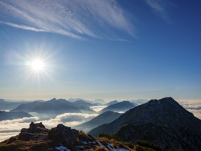Blue-colored silhouette of mountains, fog in the valley, Hochstaufen, Chiemgau Alps, Upper Bavaria,