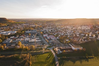 Urban environment in autumn viewed from the air during sunset, Großbottwar, Germany