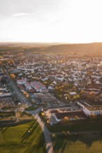 Autumn city view at sunset with roads and numerous buildings, Großbottwar, Germany