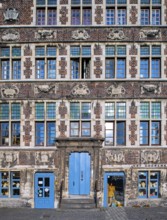 Façade of 17th century baroque guildhall Korenmetershuis at the Graslei in the city Ghent, East