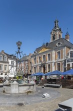 Li Bassinia, 15th century fountain and 18th century town hall at the Grand Place in the city Huy in