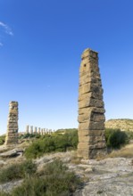 Stone columns of ancient aqueduct, Roman site of Los Banales, near Layana, Zaragoza province,