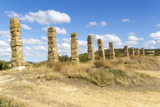 Stone columns of ancient aqueduct, Roman site of Los Banales, near Layana, Zaragoza province,