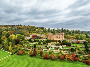Autumn colours over Powis Castle and Garden from drone, Welshpool, Powys, Wales, England, United
