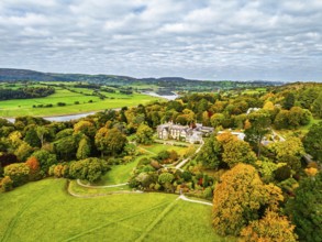 Autumn colours over Bodnant House and Garden from a drone, Conwy River, Colwyn Bay, Conwy, Wales,