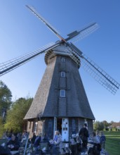 Café guests of a historic windmill, now café, Ahrenshoop, Darß, Mecklenburg-Western Pomerania,