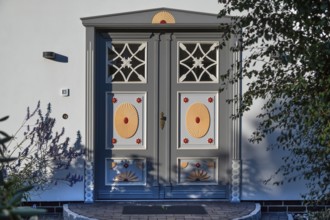 Artistically designed front door of a residential building, Ahrenshoop, Darß, Mecklenburg-Western