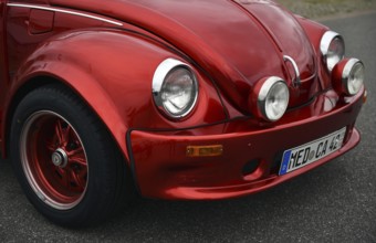 Red VW Beetle at classic car meeting in Büsum, Schleswig-Holstein, Germany