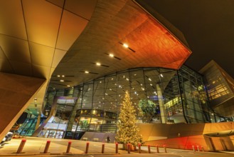 Illuminated Christmas tree in front of the colorful BMW world, Petuelring, Munich, Upper Bavaria,