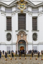 Alphorn group playing in front of Marienmünster in Dießen am Lake Ammer, Upper Bavaria, Bavaria,