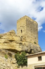 Tower of ruined castle, medieval village of Luesia, Cinco Villas, Zaragoza province, Aragon, Spain