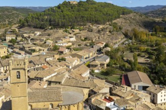 Church tower and rooftops of medieval village of Uncastillo, Cinco Villas, Zaragoza province,