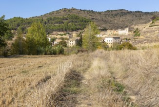 View from fielding countryside to rural houses village of Uncastillo, Cinco Villas, Zaragoza