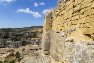 Castle walls built on rock outcrop, medieval village of Uncastillo, Cinco Villas, Zaragoza