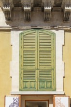 Traditional house window, Ragusa Ibla, Ragusa province, Sicily, Italy