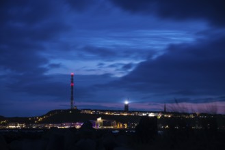 Panoramic view, view of the highlands of the island of Heligoland at night with red-lit radio