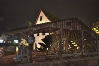 Nocturnal view of historic Schleifmühle waterwheel, Lauf an der Pegnitz, Middle Franconia, Bavaria,