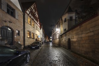 Nocturnal view of an old town alleyway with historic buildings, Lauf an der Pegnitz, Middle