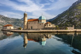 Former Perast seafaring center with the interesting offshore island of Gospa od Skrpjela - St.