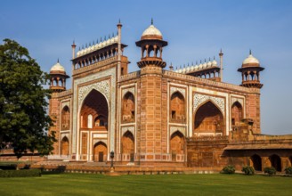 Red sandstone entrance gate, Taj Mahal, most famous building of the Mughal period in Agra