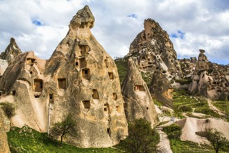 Residential caves at Uechisar Castle, fantastic tuff rock formations, Cappadocia, Turkey