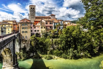 Ponte del Diavolo from the 15th century leads across the Natisone river to the old town, Devil's