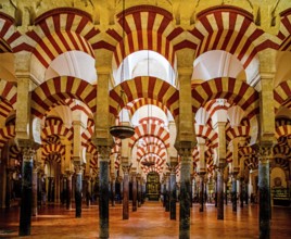 Columned forest with alternating use of brick and stone and red and white paint, Mezquita, Cordoba,