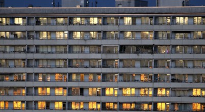 Prefabricated high-rise building with illuminated apartments on Alexanderplatz, Berlin, 05.11.2025,