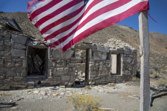 Austin, Nevada - A flag flies beside the ruins of the Walters station on the Nevada Central