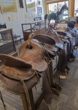 Elko, Nevada - Saddles on display at the Cowboy Arts & Gear Museum