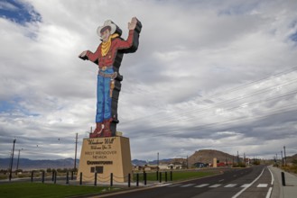 West Wendover, Nevada - Wendover Will, a neon-lit cigarette smoking cowboy, welcomes travelers to