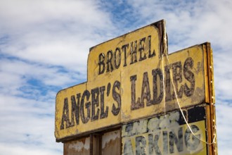 Beatty, Nevada - A sign for Angel's Ladies Brothel. Prostitution is legal in many parts of Nevada,