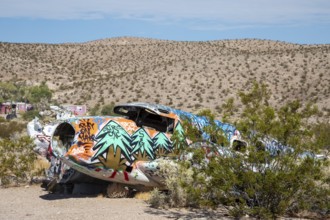 Beatty, Nevada - A decorated twin-engine airplane lies in the desert after a 1977 crash. The