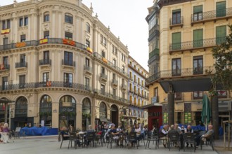 People sitting outside at cafe tables, Plaza del Pilar, city centre of Zaragoza, Aragon, Spain