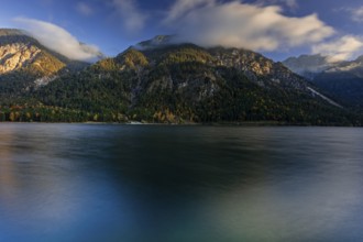 Mountain lake, evening light, mountains, windy, clouds, autumn, autumn color, Plansee, Tyrol,